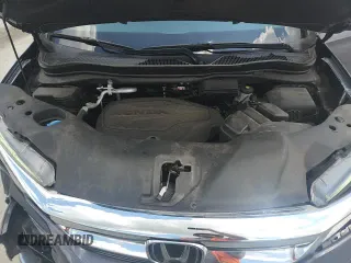 2021 Honda Pilot Touring 7-Passenger с VIN 5FNYF5H64MB019410, выставлен на аукционе Copart как лот 66324875 с пробегом 60 690 миль миль и Списание • Salvage title. История ставок и продаж доступна на DreamBid. Изображение 16.