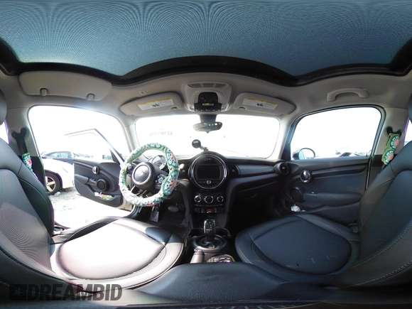 2020 MINI Hardtop 4 Door Cooper with VIN WMWXU7C01L2M54710, listed as a IAAI auction lot 42385956 with 55,714 mi miles and . Bid and sale history available at DreamBid. Image 18.
