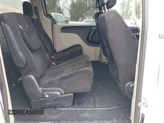 2014 Dodge Grand Caravan SXT with VIN 2C4RDGCG1ER304836, listed as a IAAI auction lot 42049558 with 186,831 mi miles and . Bid and sale history available at DreamBid. Image 8.