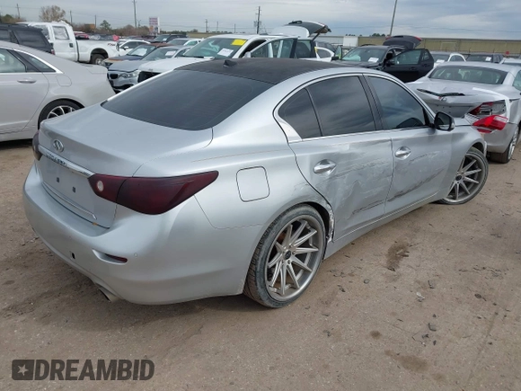 2014 Infiniti Q50 with VIN JN1BV7AP0EM681679, listed as a IAAI auction lot 41371773 with 141,940 mi miles. Bid and sale history available at carsss.com. Image 4.