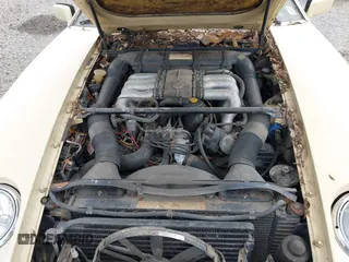 1982 Porsche 928 z VIN WP0JA0921CS820795, wystawiony jako IAAI lot #41741787 z przebiegiem 121 568 mil mil oraz . Historia ofert i sprzedaży dostępna na DreamBid. Obrazek 10.
