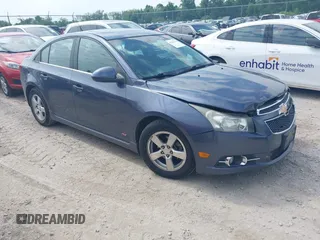 2014 Chevrolet Cruze 1LT with VIN 1G1PC5SBXE7183545, listed as a IAAI auction lot 42242578 with 170,432 mi miles and . Bid and sale history available at DreamBid. Image 1.