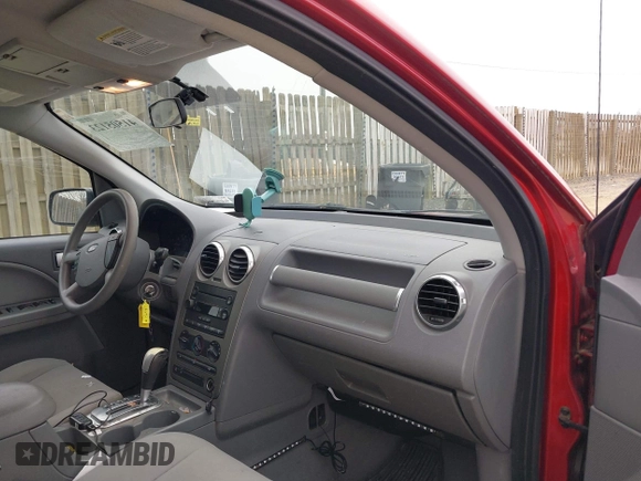 2005 Ford Freestyle SE with VIN 1FMZK04155GA08061, listed as a IAAI auction lot 41505123 with 223,524 mi miles. Bid and sale history available at carsss.com. Image 5.