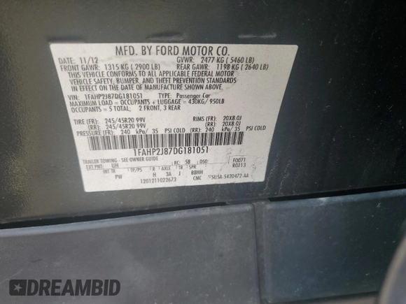 2013 Ford Taurus Limited with VIN 1FAHP2J87DG181051, listed as a Copart auction lot 70630404 with 157,323 mi miles and Salvage title. Bid and sale history available at DreamBid. Image 12.