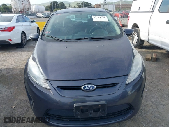 2013 Ford Fiesta SE with VIN 3FADP4EJ6DM205708, listed as a IAAI auction lot 42051721 with 139,143 mi miles. Bid and sale history available at carsss.com. Image 6.