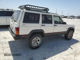 1996 Jeep Cherokee Sport with VIN 1J4FJ68S1TL128597, listed as a Copart auction lot 49600545 with 201,074 mi miles and Salvage title. Bid and sale history available at DreamBid. Image 3.