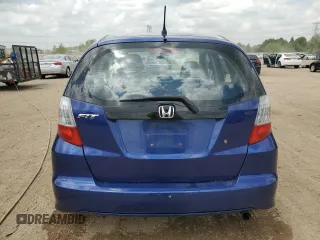 2009 Honda Fit with VIN JHMGE88229S049270, listed as a Copart auction lot 56935235 with 118,649 mi miles and Salvage title. Bid and sale history available at DreamBid. Image 6.