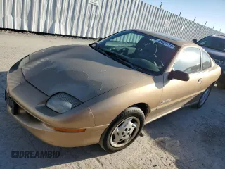 1999 Pontiac Sunfire SE z VIN 1G2JB1245X7529115, wystawiony jako Copart lot #48825115 z przebiegiem 165 634 mil mil oraz Tytuł czysty. Historia ofert i sprzedaży dostępna na DreamBid. Obrazek 1.