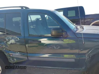 2005 Jeep Liberty Sport with VIN 1J4GL48K05W584675, listed as a IAAI auction lot 41867491 with 112,882 mi miles. Bid and sale history available at carsss.com. Image 13.