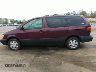 2000 Toyota Sienna LE with VIN 4T3ZF13C8YU209477, listed as a IAAI auction lot 41952970 with 293,084 mi miles. Bid and sale history available at carsss.com. Image 15.