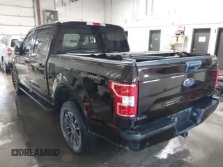 2020 Ford F-150 XL with VIN 1FTEW1E40LKE55705, listed as a IAAI auction lot 41603276 with 33,603 mi miles. Bid and sale history available at carsss.com. Image 3.