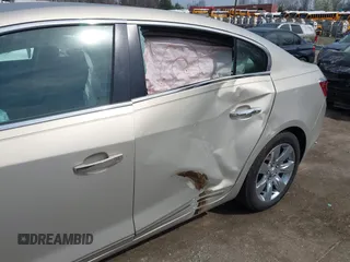 2012 Buick LaCrosse Premium 1 z VIN 1G4GD5E37CF149117, wystawiony jako IAAI lot #41791867 z przebiegiem 123 062 mil mil oraz . Historia ofert i sprzedaży dostępna na DreamBid. Obrazek 12.