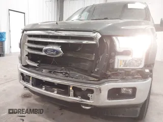 2015 Ford F-150 XLT with VIN 1FTEW1EP0FKE41589, listed as a IAAI auction lot 41345180 with 152,772 mi miles. Bid and sale history available at carsss.com. Image 6.