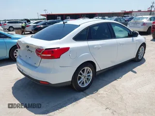 2017 Ford Focus SE with VIN 1FADP3F28HL307889, listed as a IAAI auction lot 42414711 with 169,579 mi miles and . Bid and sale history available at DreamBid. Image 4.