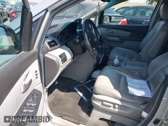 2012 Honda Odyssey Touring с VIN 5FNRL5H91CB004546, выставлен на аукционе IAAI как лот 42175002 с пробегом 118 719 миль миль и . История ставок и продаж доступна на DreamBid. Изображение 5.