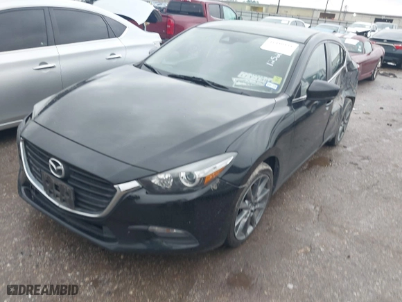 2018 Mazda Mazda3 4-Door Touring with VIN 3MZBN1V35JM243351, listed as a IAAI auction lot 41459525 with 55,765 mi miles. Bid and sale history available at carsss.com. Image 16.