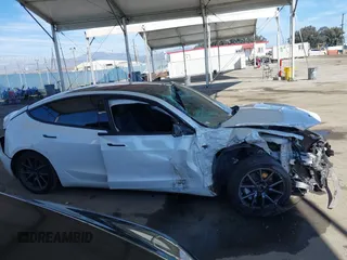 2018 Tesla Model 3 Long Range Battery z VIN 5YJ3E1EB3JF187543, wystawiony jako IAAI lot #41879169 z przebiegiem 74 144 mil mil oraz . Historia ofert i sprzedaży dostępna na DreamBid. Obrazek 14.