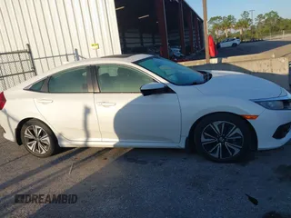 2017 Honda Civic Sedan EX-L with VIN 19XFC1F75HE032229, listed as a IAAI auction lot 41456959 with 137,386 mi miles. Bid and sale history available at carsss.com. Image 13.