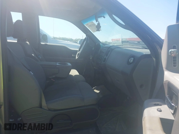 2007 Ford F-150 STX with VIN 1FTRX14W47FA54576, listed as a IAAI auction lot 41971521 with 220,945 mi miles. Bid and sale history available at carsss.com. Image 5.