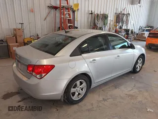 2014 Chevrolet Cruze 1LT with VIN 1G1PC5SB2E7296549, listed as a IAAI auction lot 42797744 with 137,343 mi miles and . Bid and sale history available at DreamBid. Image 4.