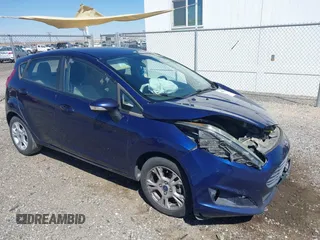 2016 Ford Fiesta SE z VIN 3FADP4EJ8GM150098, wystawiony jako IAAI lot #41890402 z przebiegiem 126 492 mil mil oraz . Historia ofert i sprzedaży dostępna na DreamBid. Obrazek 1.