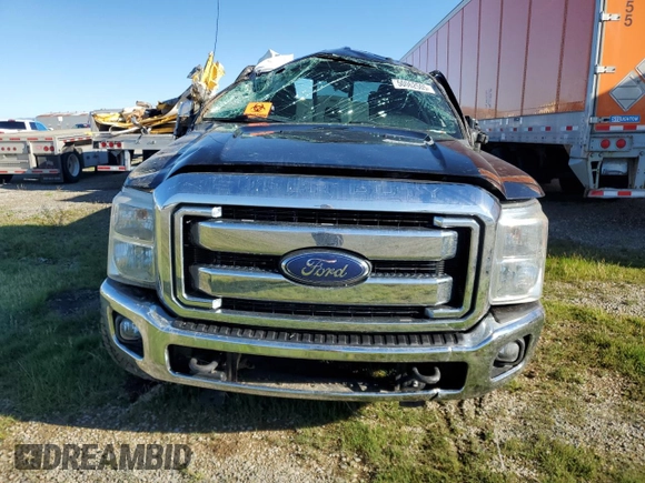 2014 Ford F-350 XLT with VIN 1FT8W3BT2EEA54050, listed as a Copart auction lot 50062505 with 142,252 mi miles and Salvage title. Bid and sale history available at DreamBid. Image 5.