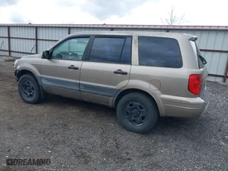 2004 Honda Pilot LX with VIN 2HKYF18144H501874, listed as a IAAI auction lot 41717956 with 290,828 mi miles. Bid and sale history available at carsss.com. Image 3.