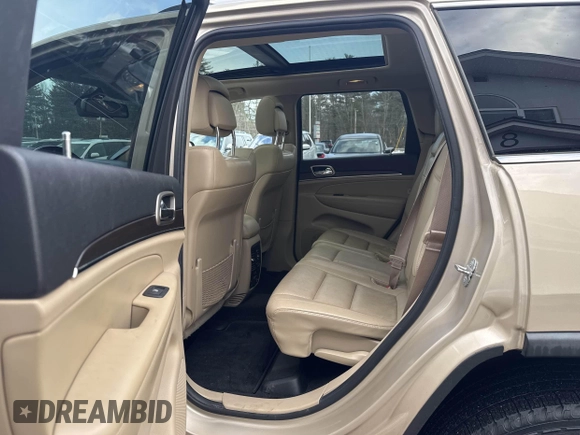 2014 Jeep Grand Cherokee Limited z VIN 1C4RJFBM2EC315721, wystawiony jako IAAI lot #41512041 z przebiegiem 180 972 mil mil oraz . Historia ofert i sprzedaży dostępna na DreamBid. Obrazek 8.
