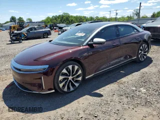 2022 Lucid Air Grand Touring z VIN 50EA1GBA0NA003171, wystawiony jako Copart lot #56913135 z przebiegiem 20 527 mil mil oraz Szkody całkowita. Historia ofert i sprzedaży dostępna na DreamBid. Obrazek 1.
