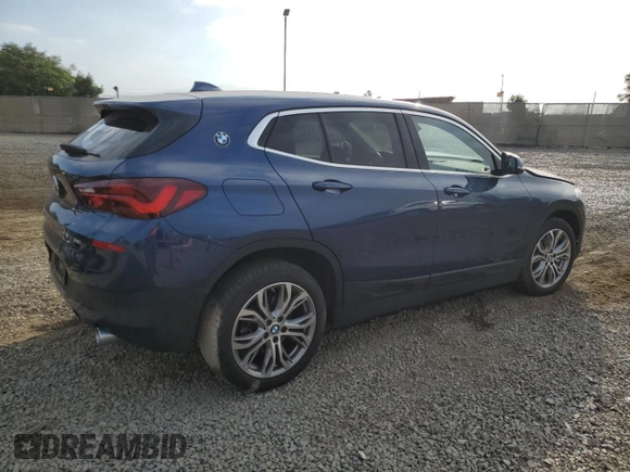 2022 BMW X2 sDrive28i with VIN WBXYH9C08N5T69987, listed as a Copart auction lot 71108184 with 44,169 mi miles and Salvage Title. Bid and sale history available at carsss.com. Image 3.