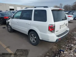 2006 Honda Pilot EX-L with VIN 2HKYF18576H517590, listed as a IAAI auction lot 41802601 with 233,833 mi miles. Bid and sale history available at carsss.com. Image 3.