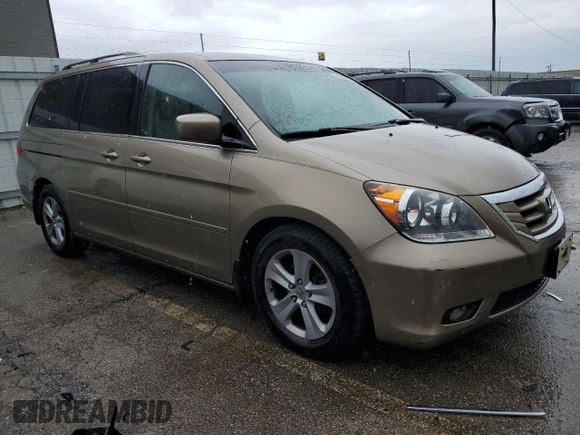 2009 Honda Odyssey Touring с VIN 5FNRL38929B048214, выставлен на аукционе Copart как лот 56735165 с пробегом 158 532 миль миль и Чистый • Clean title. История ставок и продаж доступна на DreamBid. Изображение 4.