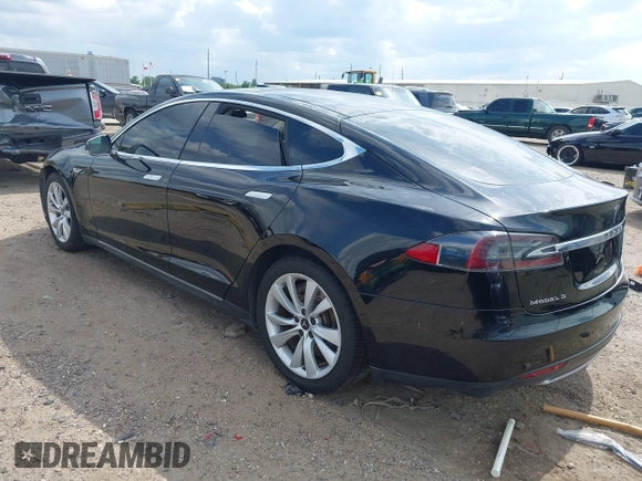 2014 Tesla Model S 60 z VIN 5YJSA1H1XEFP44397, wystawiony jako IAAI lot #42140917 z przebiegiem 136 515 mil mil oraz . Historia ofert i sprzedaży dostępna na DreamBid. Obrazek 3.