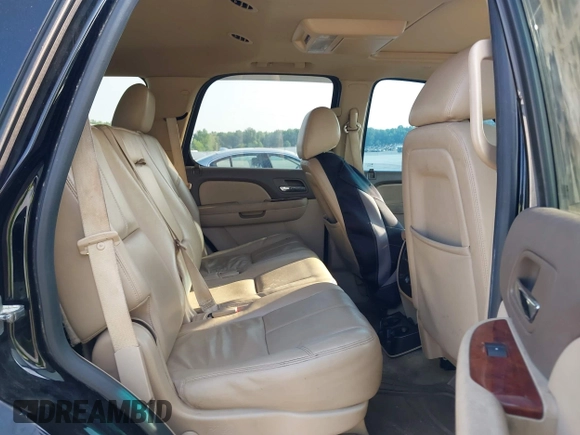 2014 Chevrolet Tahoe LT with VIN 1GNSCBE01ER235571, listed as a IAAI auction lot 42403118 with 238,069 mi miles and . Bid and sale history available at DreamBid. Image 8.