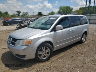 2010 Dodge Grand Caravan SXT z VIN 2D4RN5DX6AR390609, wystawiony jako Copart lot #57143385 z przebiegiem 143 825 mil mil oraz Czysty tytuł • Clean title. Historia ofert i sprzedaży dostępna na DreamBid. Obrazek 1.