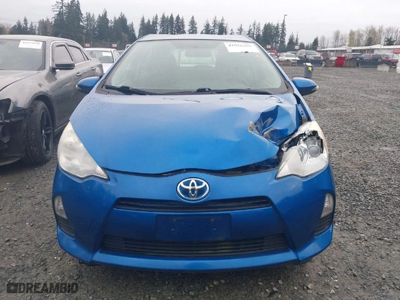 2013 Toyota Prius c One with VIN JTDKDTB39D1058324, listed as a IAAI auction lot 41916103 with 68,079 mi miles. Bid and sale history available at carsss.com. Image 12.