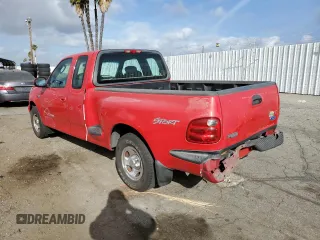 2003 Ford F-150 XL with VIN 1FTRX07213KB93777, listed as a Copart auction lot 46950285 with 176,332 mi miles and Salvage title. Bid and sale history available at DreamBid. Image 2.