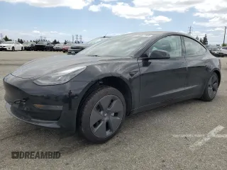 2023 Tesla Model 3 with VIN 5YJ3E1EA7PF600239, listed as a Copart auction lot 56557705 with 18,851 mi miles and Salvage title. Bid and sale history available at DreamBid. Image 1.