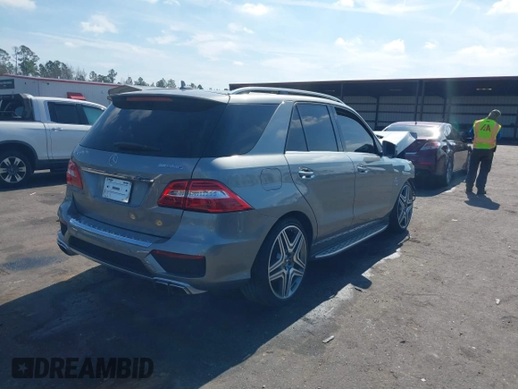 2013 Mercedes-Benz M ML 63 AMG with VIN 4JGDA7EB9DA155725, listed as a IAAI auction lot 41502675 with 64,849 mi miles. Bid and sale history available at carsss.com. Image 4.