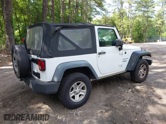 2012 Jeep Wrangler Sport with VIN 1C4AJWAG7CL192200, listed as a IAAI auction lot 42472398 with 198,999 mi miles and . Bid and sale history available at DreamBid. Image 4.
