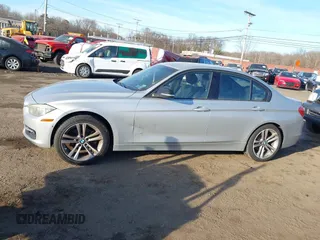 2013 BMW 3 Series 328i xDrive with VIN WBA3B3C56DF540744, listed as a IAAI auction lot 41433347 with 162,328 mi miles and . Bid and sale history available at DreamBid. Image 14.