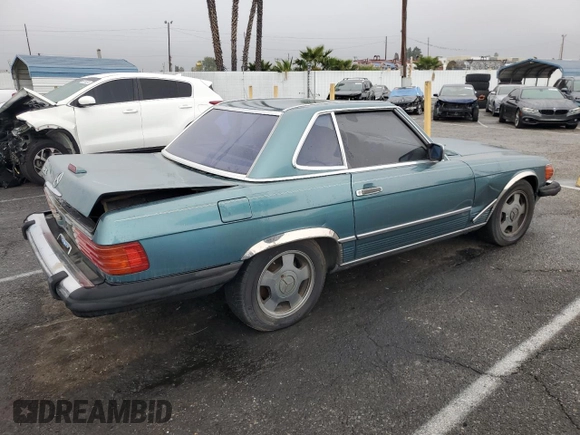 1989 Mercedes-Benz 560 SL с VIN WDBBA48D7KA100368, выставлен на аукционе Copart как лот 86422614 с пробегом 171 003 миль миль и Чистый • Clean title. История ставок и продаж доступна на DreamBid. Изображение 3.