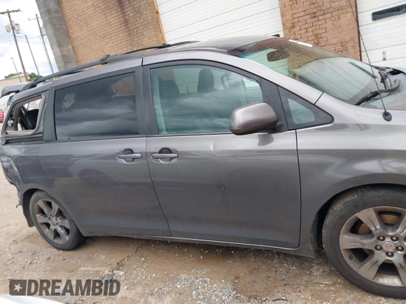 2012 Toyota Sienna SE with VIN 5TDXK3DC2CS235211, listed as a IAAI auction lot 42390354 with 242,602 mi miles and . Bid and sale history available at DreamBid. Image 14.