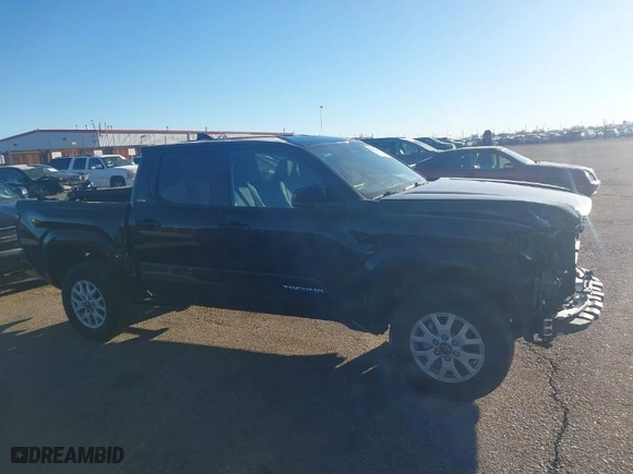 2024 Toyota Tacoma 2WD SR5 with VIN 3TMKB5FN0RM011416, listed as a IAAI auction lot 41303796 with 9,923 mi miles. Bid and sale history available at carsss.com. Image 14.