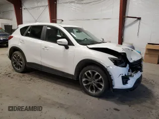 2016 Mazda CX-5 Grand Touring with VIN JM3KE4DYXG0836028, listed as a Copart auction lot 49279565 with 96,672 mi miles and Non Repairable. Bid and sale history available at carsss.com. Image 4.