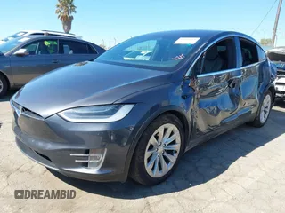 2018 Tesla Model X 75D with VIN 5YJXCBE26JF121937, listed as a IAAI auction lot 41652666 with 93,478 mi miles and . Bid and sale history available at carsss.com. Image 2.