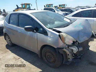 2009 Honda Fit with VIN JHMGE88249S036133, listed as a IAAI auction lot 41788358 with 128,613 mi miles. Bid and sale history available at carsss.com. Image 1.