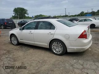 2012 Ford Fusion Hybrid с VIN 3FADP0L35CR184476, выставлен на аукционе Copart как лот 63907885 с пробегом 230 589 миль миль и Списание • Salvage title. История ставок и продаж доступна на DreamBid. Изображение 2.