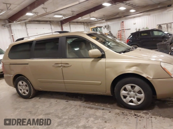 2009 Kia Sedona LX with VIN KNDMB233996314804, listed as a IAAI auction lot 42014187 with 220,693 mi miles and . Bid and sale history available at DreamBid. Image 13.
