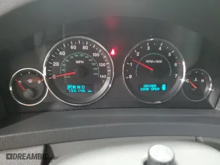 2007 Jeep Grand Cherokee Laredo with VIN 1J8GR48K27C687033, listed as a Copart auction lot 52401165 with 135,146 mi miles and Salvage Title. Bid and sale history available at carsss.com. Image 9.